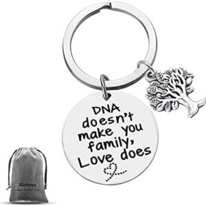 DNA Doesn’t Make You Family Keychain